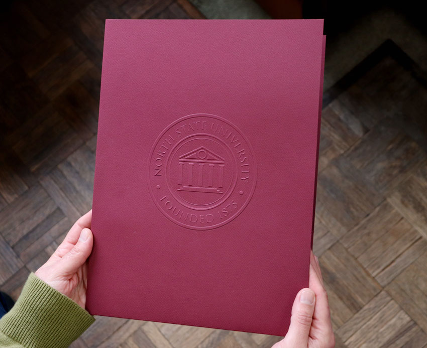Embossed pocket folder